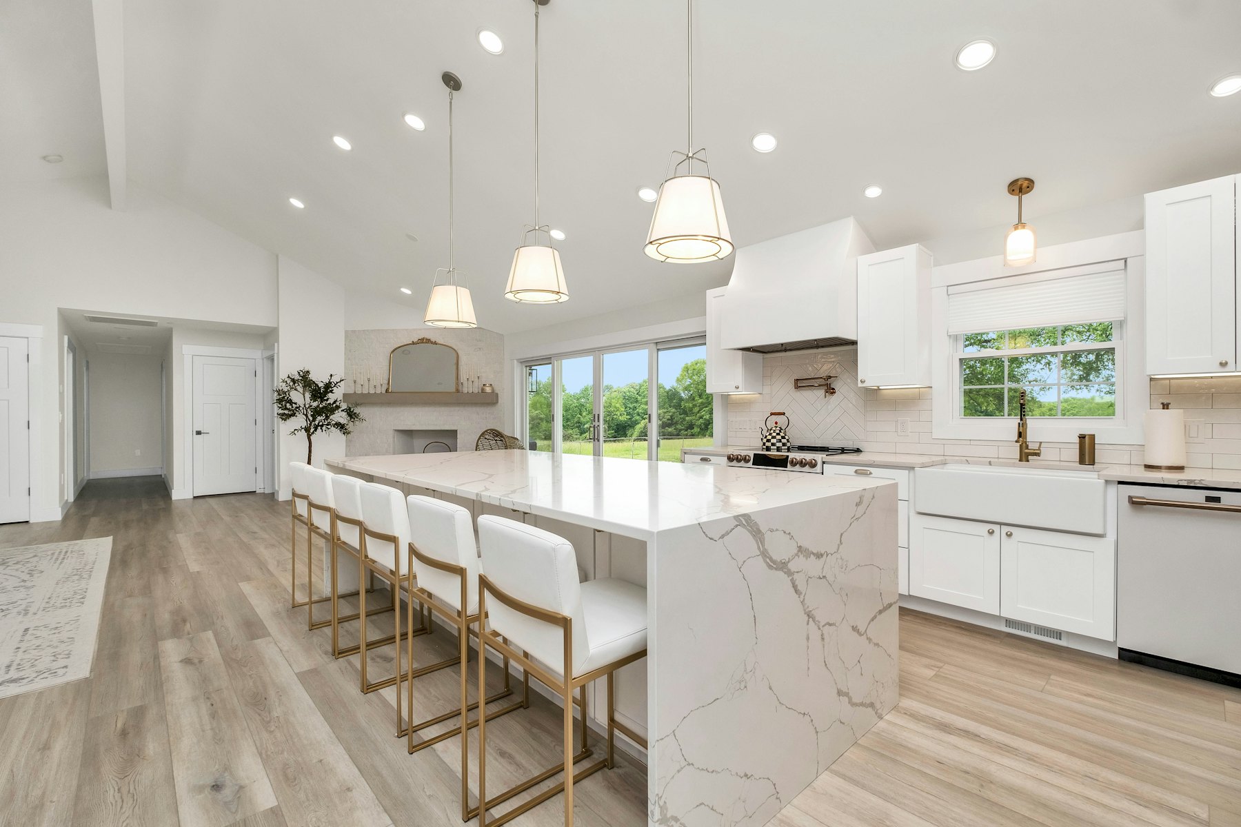 A bright modern kitchen with pendant lighting