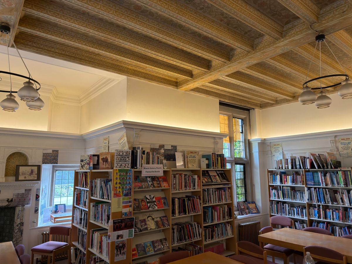 The original painted ceiling, now lit evenly from the walls