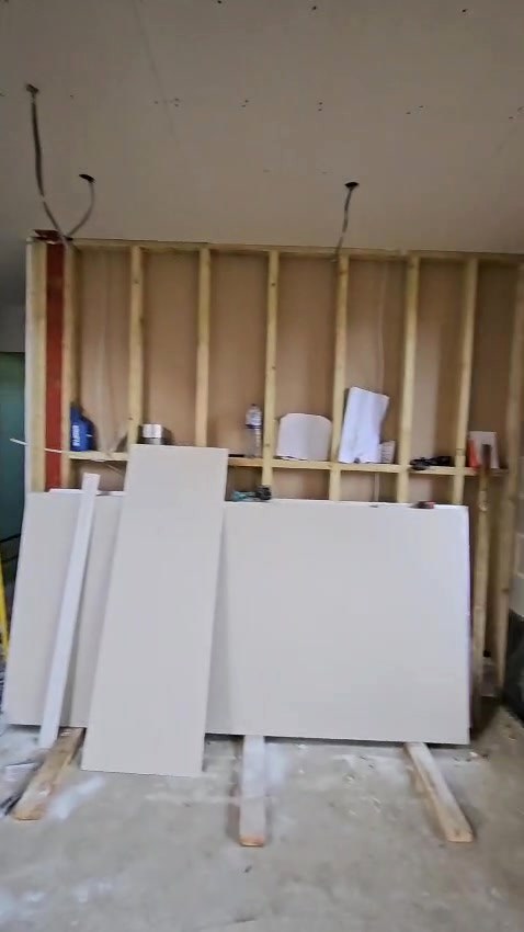 Before: wiring run through the new stud walls ahead of boarding