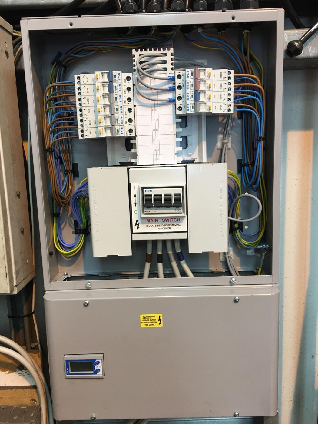 A three-phase board with RCBO protection and a built-in energy meter